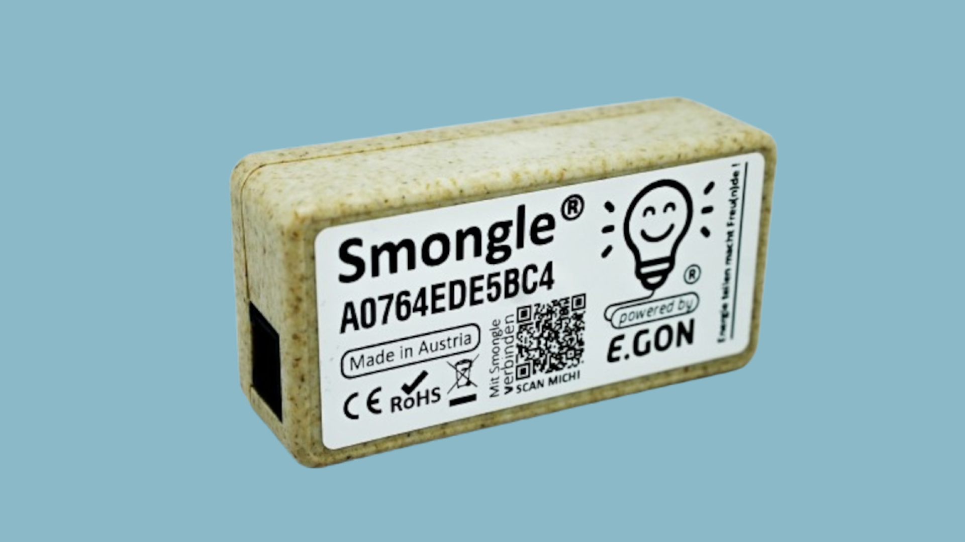Ein Produktfoto des Smongle, zu sehen ist eine rechteckige Box mit Aufdruck.